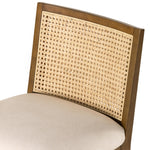 Featuring Antonia Solid Parawood Cane Armless Stool by Four Hands at Amethyst Home. Mixed materials refresh retro stool seating. Light-toasted nettlewood frames a textural inlay of natural cane for a clean, monochromatic look, with a light, linen-blend seat of high-performance fabric brings smart sensibility to bar-style seating. Performance fabrics are spec. Amethyst Home provides interior design, new home construction design consulting, vintage area rugs, and lighting in the Portland metro area.