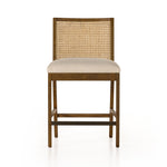 Featuring Antonia Solid Parawood Cane Armless Stool by Four Hands at Amethyst Home. Mixed materials refresh retro stool seating. Light-toasted nettlewood frames a textural inlay of natural cane for a clean, monochromatic look, with a light, linen-blend seat of high-performance fabric brings smart sensibility to bar-style seating. Performance fabrics are speci. Amethyst Home provides interior design, new home construction design consulting, vintage area rugs, and lighting in the Seattle metro area.