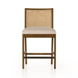 Featuring Antonia Solid Parawood Cane Armless Stool by Four Hands at Amethyst Home. Mixed materials refresh retro stool seating. Light-toasted nettlewood frames a textural inlay of natural cane for a clean, monochromatic look, with a light, linen-blend seat of high-performance fabric brings smart sensibility to bar-style seating. Performance fabrics are speci. Amethyst Home provides interior design, new home construction design consulting, vintage area rugs, and lighting in the Seattle metro area.