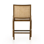 Featuring Antonia Solid Parawood Cane Armless Stool by Four Hands at Amethyst Home. Mixed materials refresh retro stool seating. Light-toasted nettlewood frames a textural inlay of natural cane for a clean, monochromatic look, with a light, linen-blend seat of high-performance fabric brings smart sensibility to bar-style seating. Performance fabrics are special. Amethyst Home provides interior design, new home construction design consulting, vintage area rugs, and lighting in the Tampa metro area.