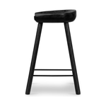 Featuring Barrett Counter Stool - Matte Black by Four Hands at Amethyst Home. The Barrett Matte Black Bar and Counter Stool is sculpted for comfort. Crafted from rich parawood, black iron stretchers lend an updated look to simply styled bar or counter seating finished in a sleek matte black.
Colors: Matte Black Parawood, Matte Black IronMaterials: Solid Parawood, IronWeight: 13.89 lbVol. Amethyst Home provides interior design, new construction, custom furniture, and rugs for the Denver metro area.