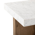 Featuring Bellamy White Carrera Marble End Table by Four Hands at Amethyst Home. Structured lines and chunky proportions fuse for a mixed material end table of smoked oak and polished marble.Collection: HughesColors: White Carrera Marble ,Smoked Oak VeneerMaterials: Carrara Solid ,Thick Oak Veneer ,Poplar Plywood Weight: 81.57 lbs. Amethyst Home provides interior design, new home construction design consulting, vintage area rugs, and lighting in the Tampa metro area.