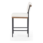 Featuring Benton Fayette Cloud Stool by Four Hands at Amethyst Home. Bring a crisp, clean look to the counter. Slim, black-finished iron forms an airy frame for pristinely tailored performance fabric, with solid oak decking for an eye-catching material mix. Performance fabrics are specially created to withstand spills, stains, high traffic and wear, ensuring long-term comfort. Amethyst Home provides interior design, new construction, custom furniture, and area rugs in the Newport Beach metro area.