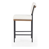 Featuring Benton Fayette Cloud Stool by Four Hands at Amethyst Home. Bring a crisp, clean look to the counter. Slim, black-finished iron forms an airy frame for pristinely tailored performance fabric, with solid oak decking for an eye-catching material mix. Performance fabrics are specially created to withstand spills, stains, high traffic and wear, ensuring long-term comfort. Amethyst Home provides interior design, new construction, custom furniture, and area rugs in the Newport Beach metro area.