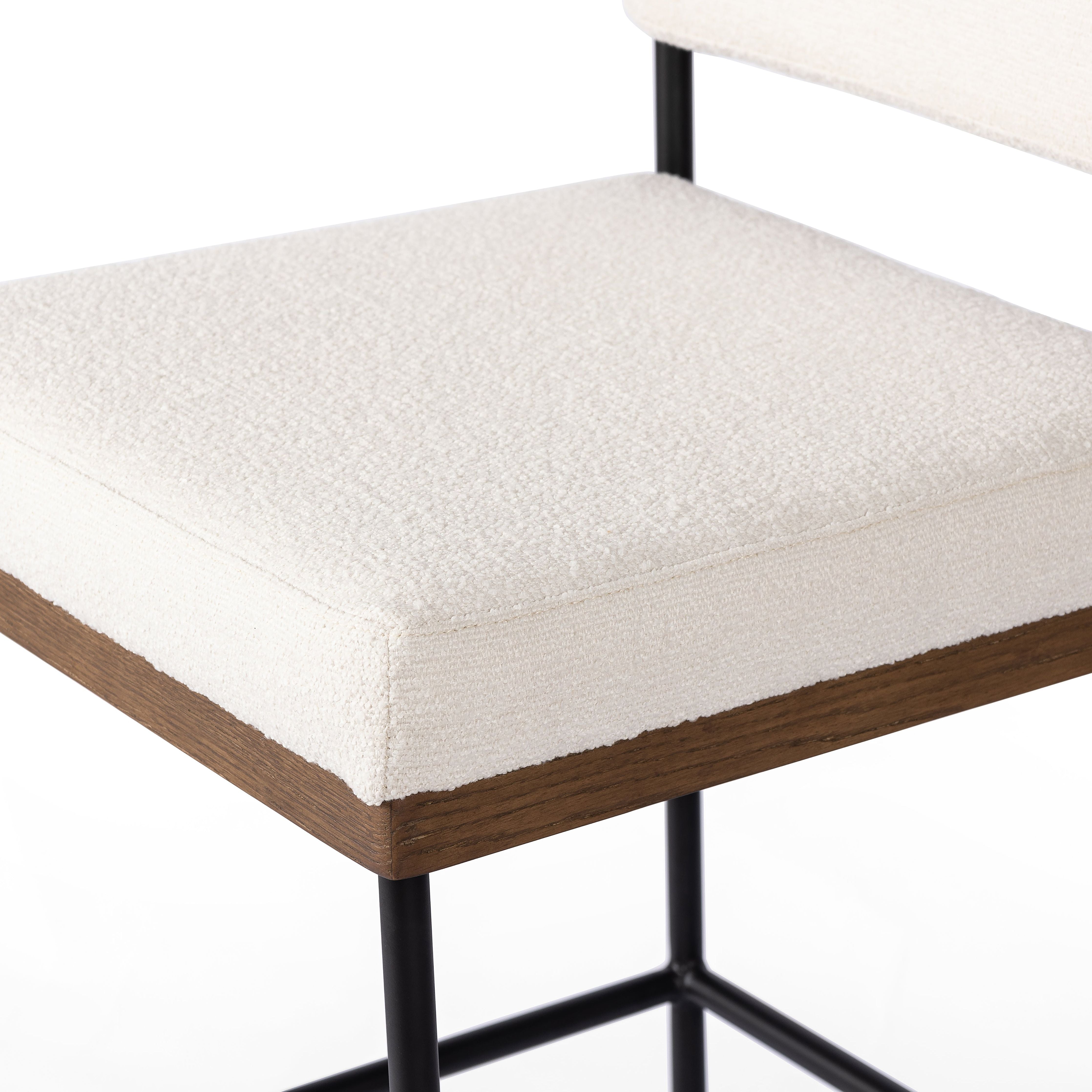 Featuring Benton Fayette Cloud Stool by Four Hands at Amethyst Home. Bring a crisp, clean look to the counter. Slim, black-finished iron forms an airy frame for pristinely tailored performance fabric, with solid oak decking for an eye-catching material mix. Performance fabrics are specially created to withstand spills, stains, high traffic and wear, ensuring long-term comfort and u. Amethyst Home provides interior design, new construction, custom furniture, and area rugs in the Seattle metro area.