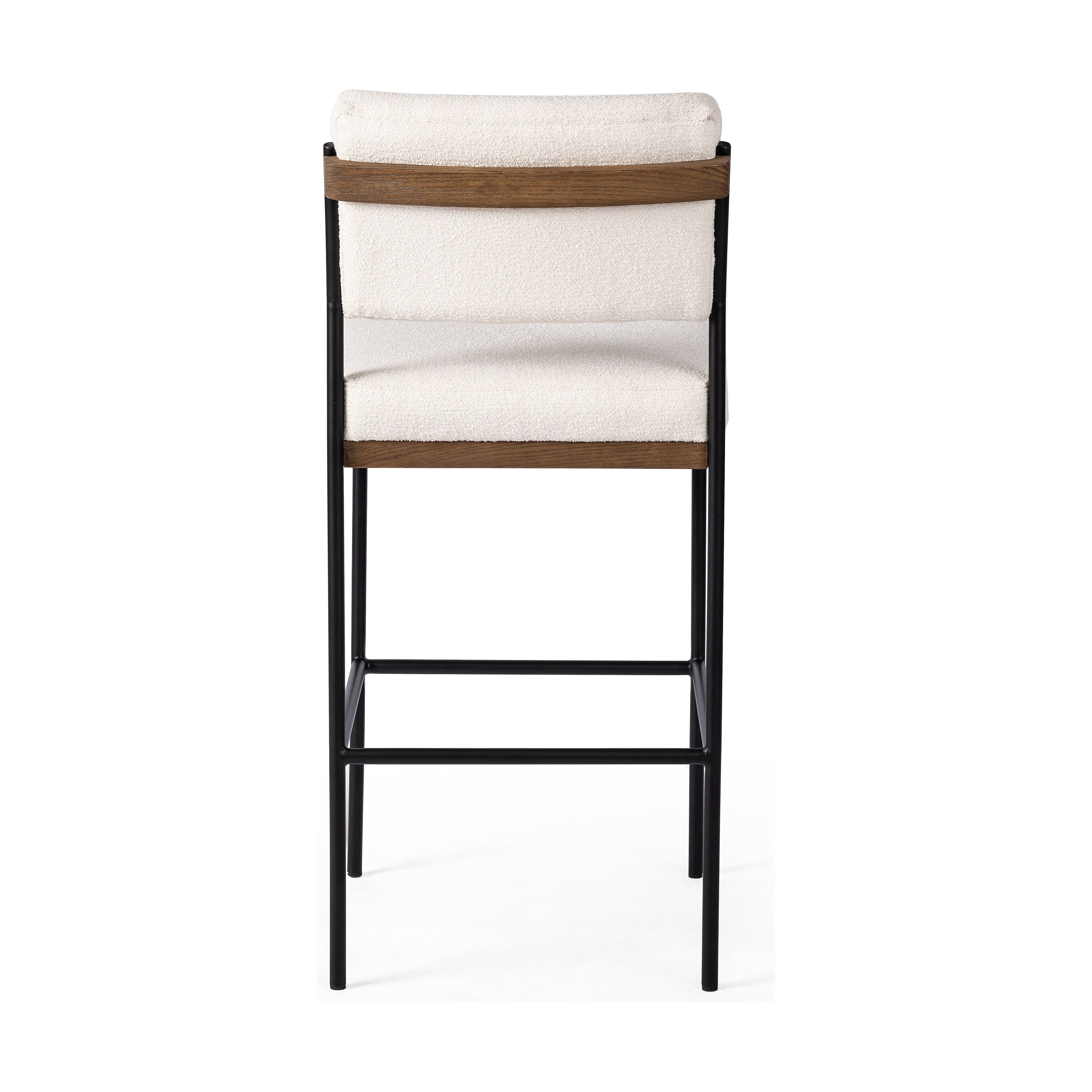 Featuring Benton Fayette Cloud Stool by Four Hands at Amethyst Home. Bring a crisp, clean look to the counter. Slim, black-finished iron forms an airy frame for pristinely tailored performance fabric, with solid oak decking for an eye-catching material mix. Performance fabrics are specially created to withstand spills, stains, high traffic and wear, ensuring long-term comfort and unm. Amethyst Home provides interior design, new construction, custom furniture, and area rugs in the Tampa metro area.