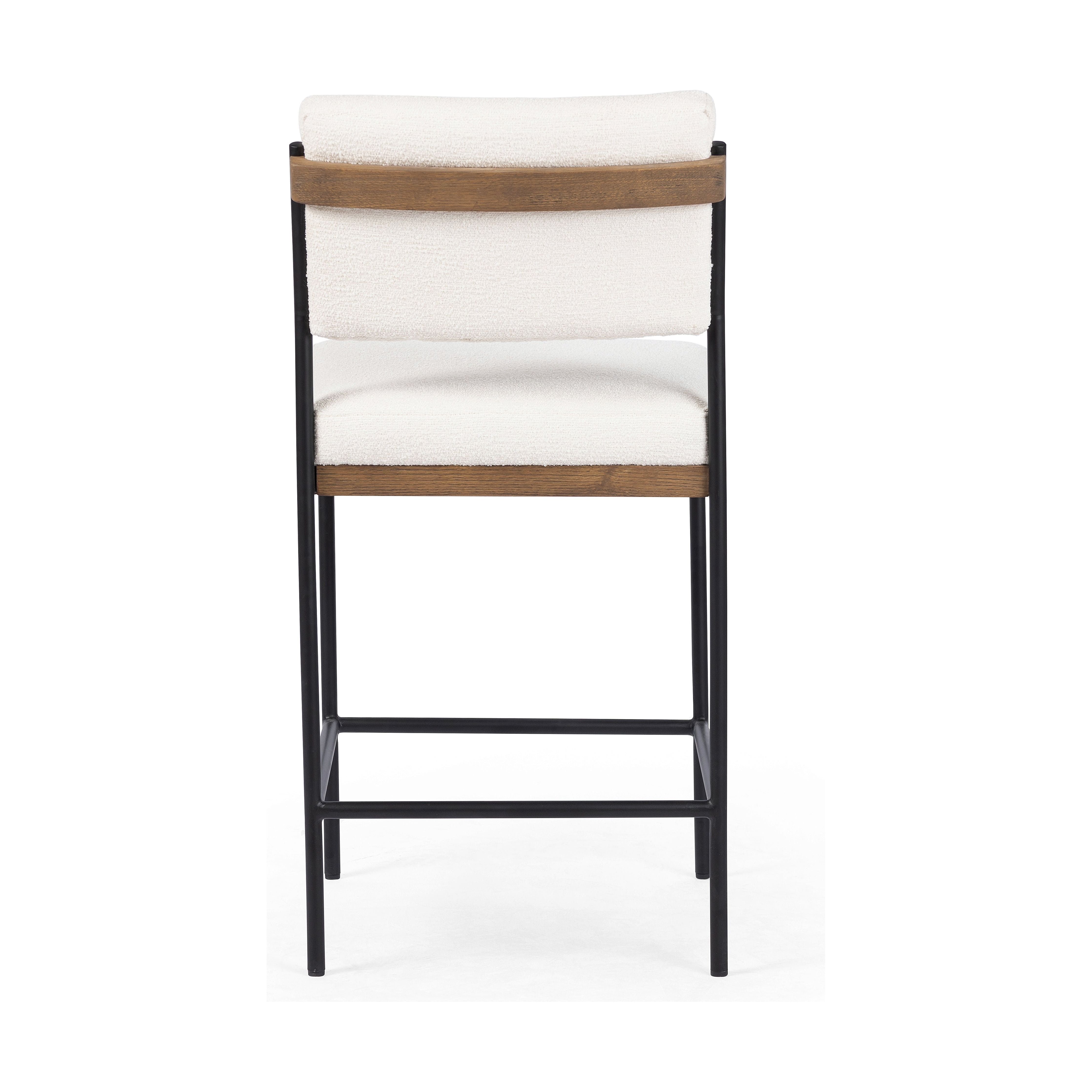 Featuring Benton Fayette Cloud Stool by Four Hands at Amethyst Home. Bring a crisp, clean look to the counter. Slim, black-finished iron forms an airy frame for pristinely tailored performance fabric, with solid oak decking for an eye-catching material mix. Performance fabrics are specially created to withstand spills, stains, high traffic and wear, ensuring long-term comfort. Amethyst Home provides interior design, new construction, custom furniture, and area rugs in the Winter Garden metro area.