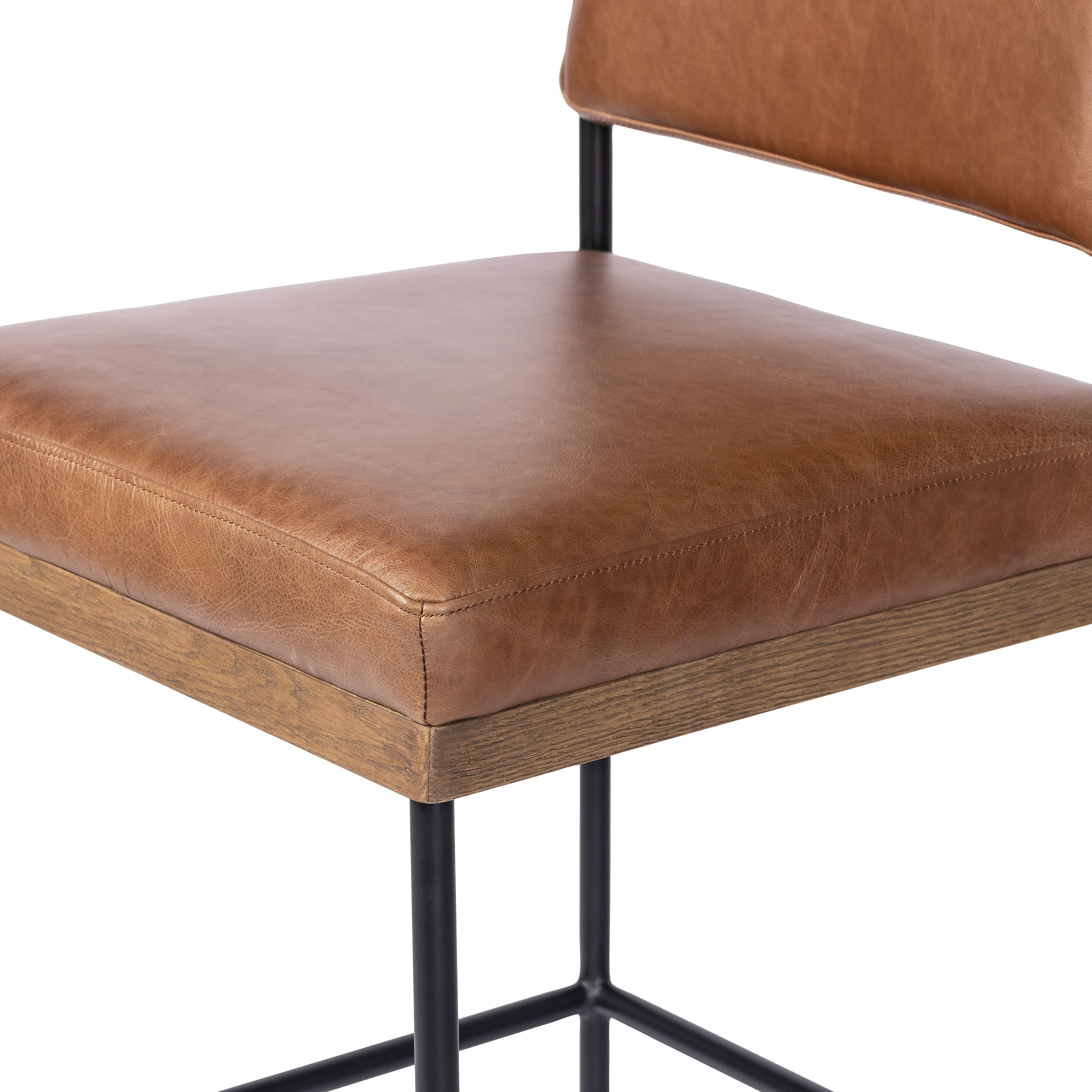 Featuring Benton Sonoma Chestnut Stool by Four Hands at Amethyst Home. Simple and streamlined with thoughtful details. Slim, black-finished round stock iron solid wood decking, plus tan top-grain leather seating for modernity. A stylish staple for any counter.
Counter Stool: 19.75"w x 23.00"d x 40.00"h
Bar Stool: 19.75"w x 23.00"d x 44.00"h
Collection: AshfordColors: Sonoma Ches. Amethyst Home provides interior design, new construction, custom furniture, and area rugs in the Alpharetta metro area.