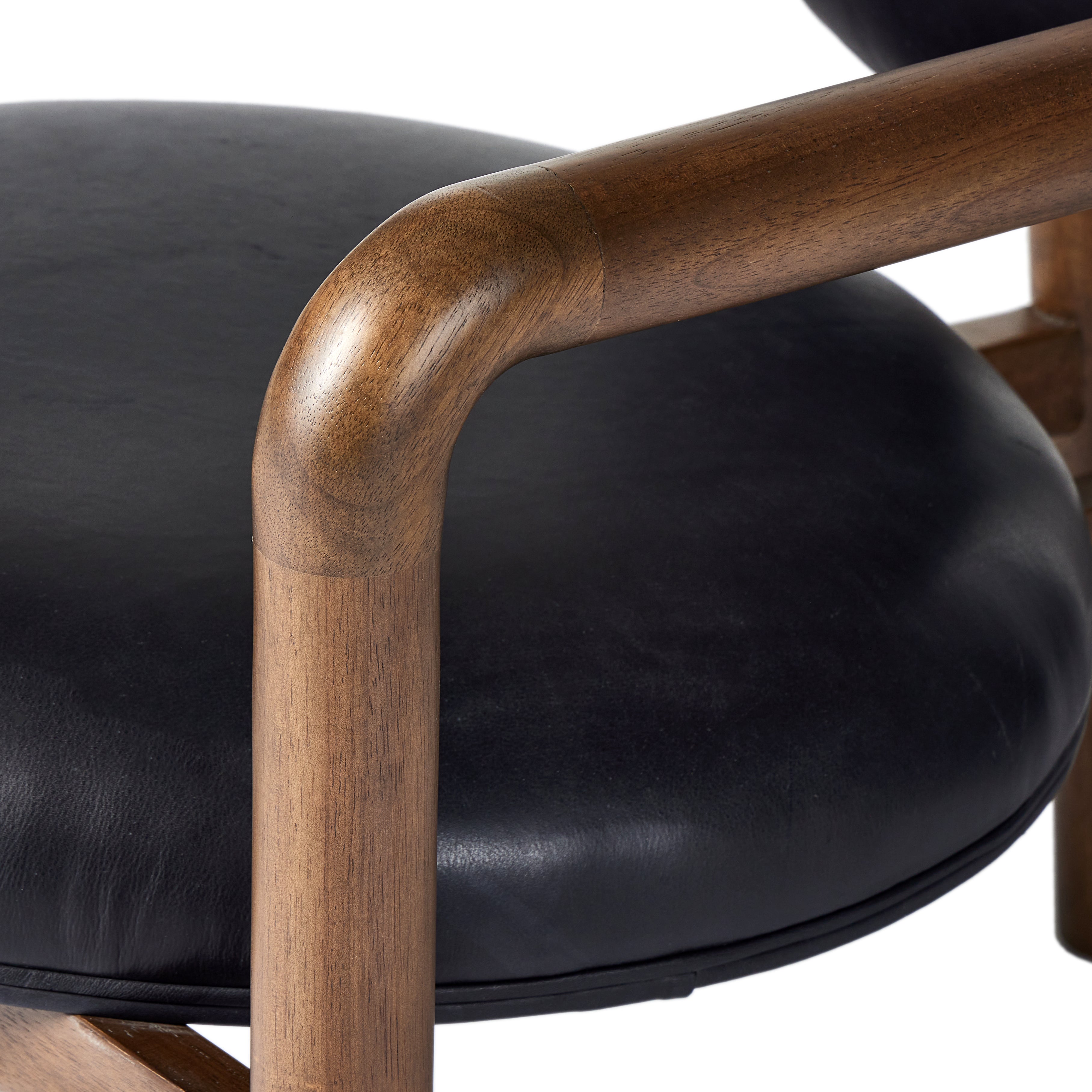 Featuring Bria Heirloom Black Chair by Four Hands at Amethyst Home. A playful take on Italian modernism. Solid parawood crafts a slim, curved frame and rear mock-tripod. Upholstered in black top-grain leather. Sourced from one of the oldest family-owned tanneries in Italy’s Bassano del Grappa, our heirloom leather covering is salvaged and processed from up. Amethyst Home provides interior design, new home construction design consulting, vintage area rugs, and lighting in the Des Moines metro area.