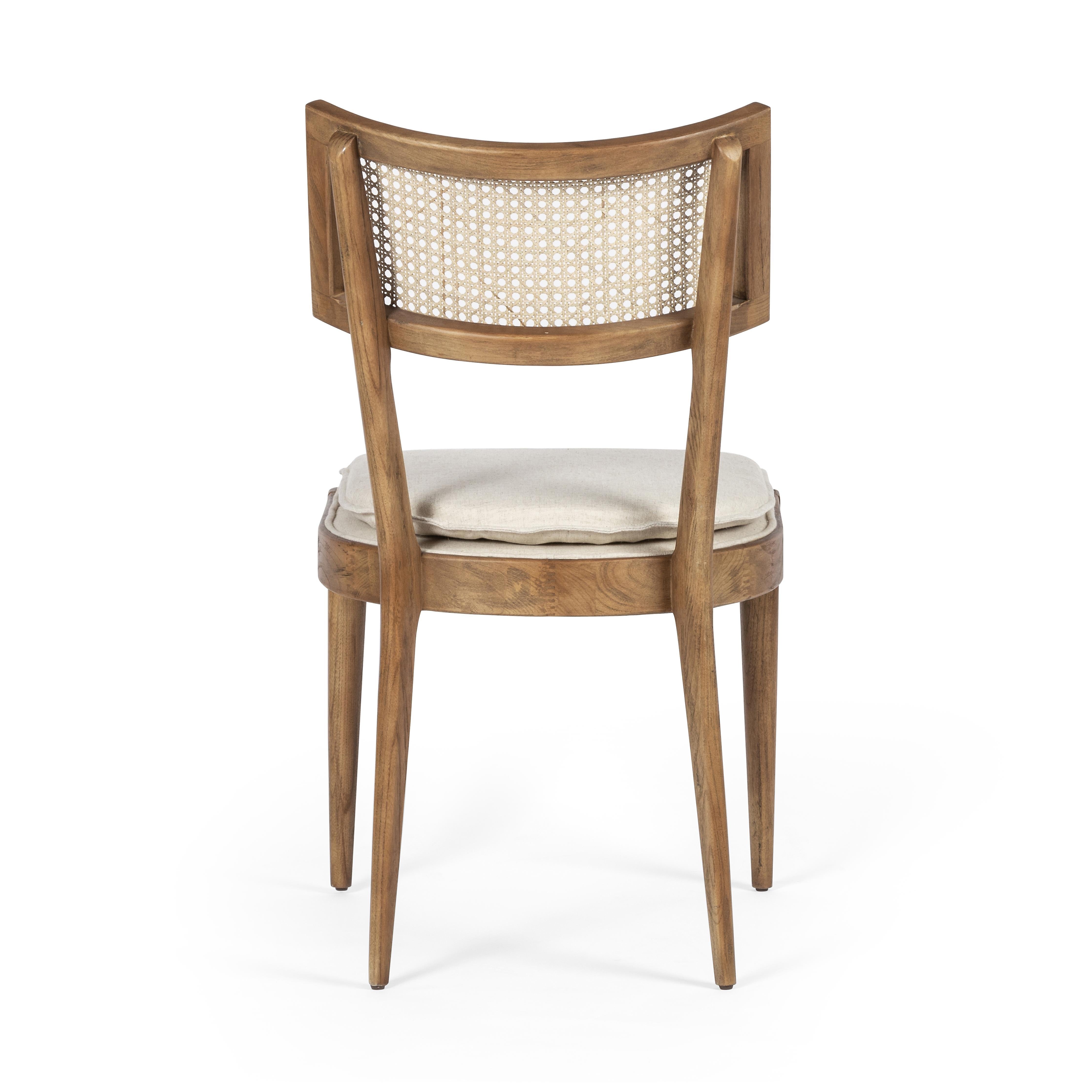 Featuring Britt Toasted Nettlewood Dining Chair by Four Hands at Amethyst Home. Mixed materials refresh retro dining style. Light-toasted nettlewood frames a textural inlay of natural cane, for perfect contrast. Fastened by Velcro, high-performance linen-blend seating for modern sensibility. Performance fabrics are specially created to withstand spills, stain. Amethyst Home provides interior design, new home construction design consulting, vintage area rugs, and lighting in the Houston metro area.