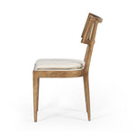 Featuring Britt Toasted Nettlewood Dining Chair by Four Hands at Amethyst Home. Mixed materials refresh retro dining style. Light-toasted nettlewood frames a textural inlay of natural cane, for perfect contrast. Fastened by Velcro, high-performance linen-blend seating for modern sensibility. Performance fabrics are specially created to withstand spills. Amethyst Home provides interior design, new home construction design consulting, vintage area rugs, and lighting in the Salt Lake City metro area.