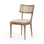 Featuring Britt Toasted Nettlewood Dining Chair by Four Hands at Amethyst Home. Mixed materials refresh retro dining style. Light-toasted nettlewood frames a textural inlay of natural cane, for perfect contrast. Fastened by Velcro, high-performance linen-blend seating for modern sensibility. Performance fabrics are specially created to withstand spills, stains,. Amethyst Home provides interior design, new home construction design consulting, vintage area rugs, and lighting in the Tampa metro area.