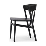 Featuring Buxton Black Oak Dining Chair by Four Hands at Amethyst Home. A solid oak dining chair defined by tapered legs and