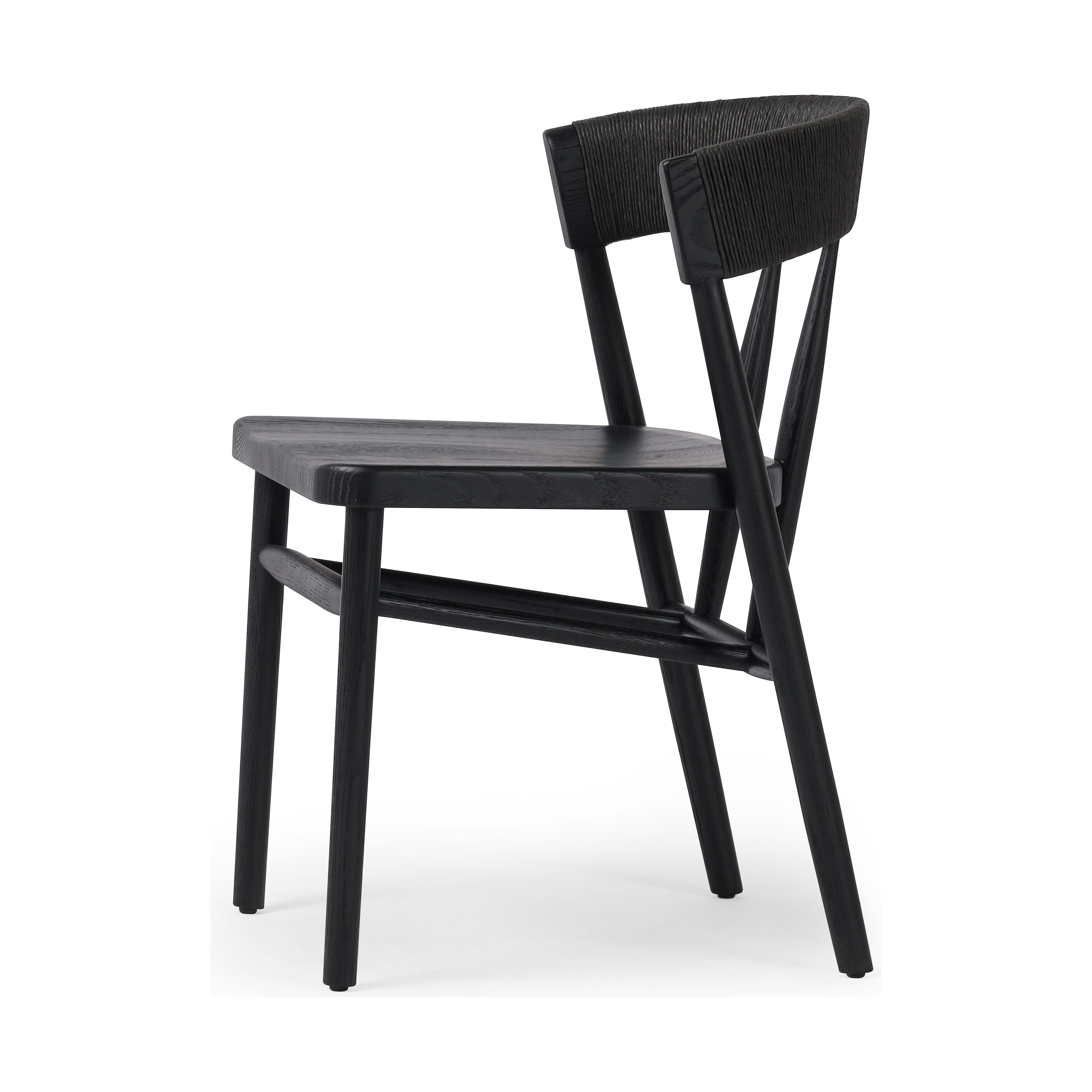 Featuring Buxton Black Oak Dining Chair by Four Hands at Amethyst Home. A solid oak dining chair defined by tapered legs and