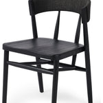 Featuring Buxton Black Oak Dining Chair by Four Hands at Amethyst Home. A solid oak dining chair defined by tapered legs and