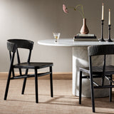 Featuring Buxton Black Oak Dining Chair by Four Hands at Amethyst Home. A solid oak dining chair defined by tapered legs and