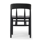 Featuring Buxton Black Oak Dining Chair by Four Hands at Amethyst Home. A solid oak dining chair defined by tapered legs and