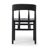 Featuring Buxton Black Oak Dining Chair by Four Hands at Amethyst Home. A solid oak dining chair defined by tapered legs and