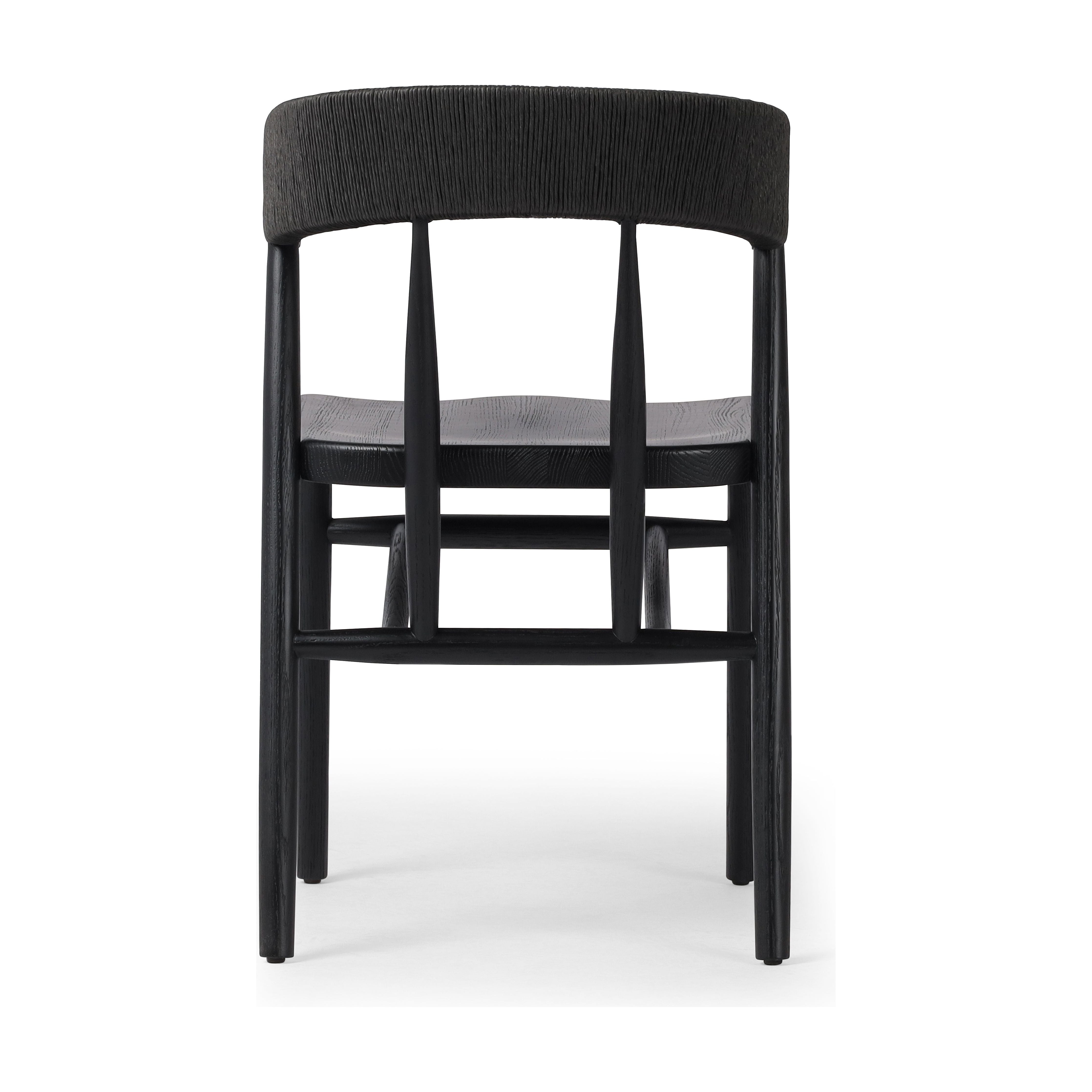 Featuring Buxton Black Oak Dining Chair by Four Hands at Amethyst Home. A solid oak dining chair defined by tapered legs and