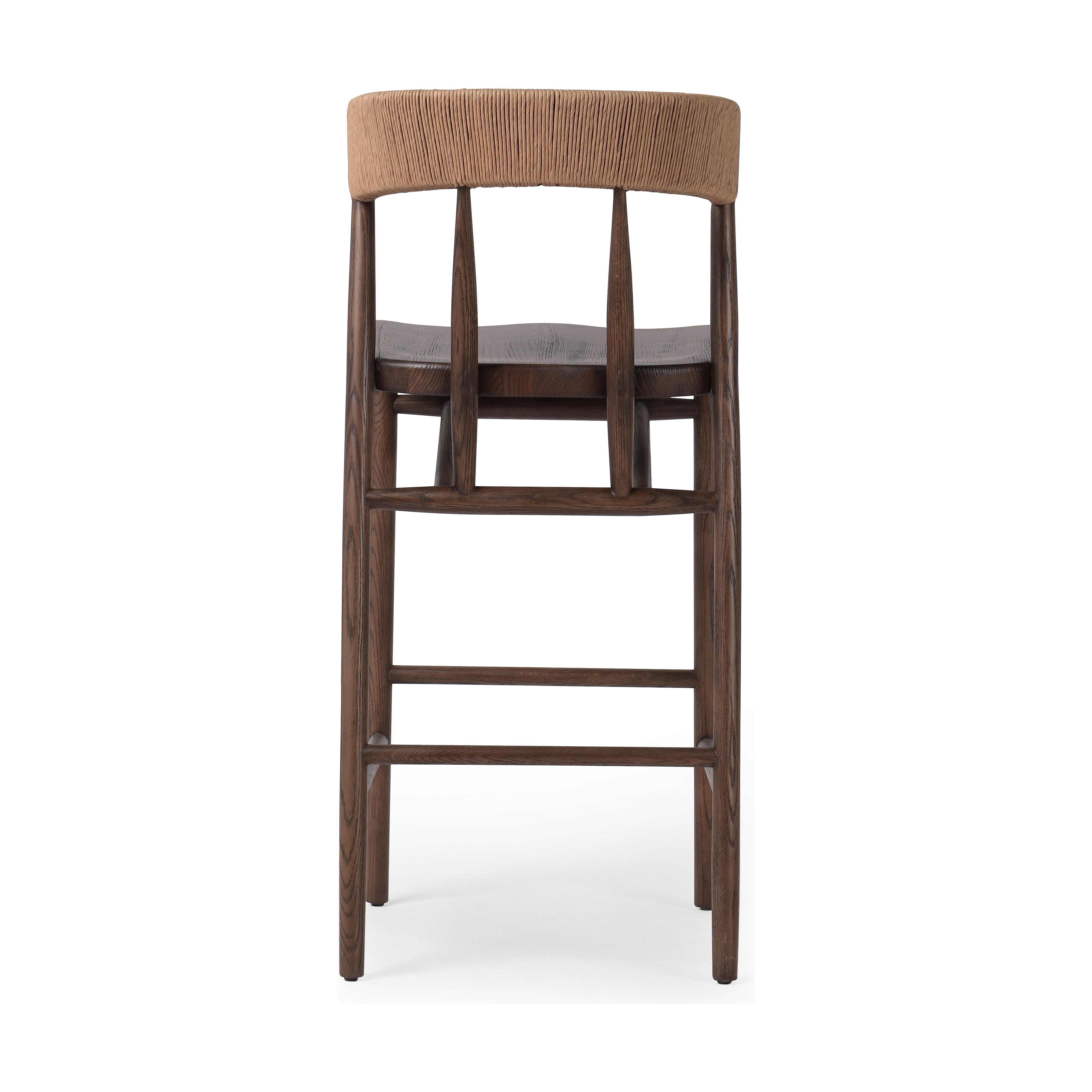 Featuring Buxton Drifted Oak-Bar Stool by Four Hands at Amethyst Home. A solid oak bar stool defined by tapered legs and framing gives an updated look to the classic whistler chair. Finished with a paper rush wrapped detail on the back.Overall Dimensions: 19.25"W x 22.25"L x 42.75"H
Collection: AllstonColors: Drifted Oak ,Natural Paper RushMaterials: Solid Oak ,Rush Dimentions. Amethyst Home provides interior design, new construction, custom furniture, and area rugs in the Laguna Beach metro area.