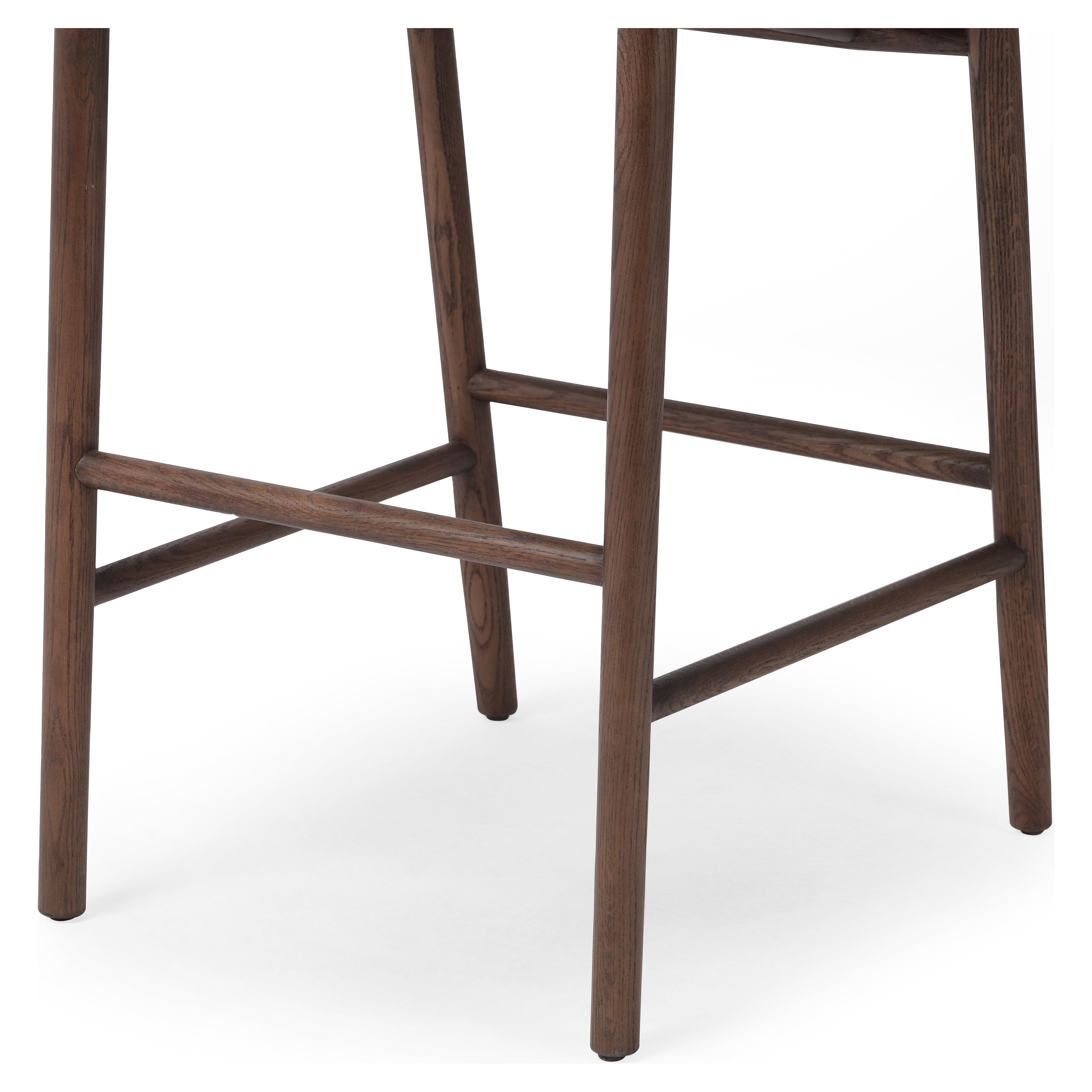 Featuring Buxton Drifted Oak-Bar Stool by Four Hands at Amethyst Home. A solid oak bar stool defined by tapered legs and framing gives an updated look to the classic whistler chair. Finished with a paper rush wrapped detail on the back.Overall Dimensions: 19.25"W x 22.25"L x 42.75"H
Collection: AllstonColors: Drifted Oak ,Natural Paper RushMaterials: Solid Oak ,Rush Dimentions: 22. Amethyst Home provides interior design, new construction, custom furniture, and area rugs in the Portland metro area.