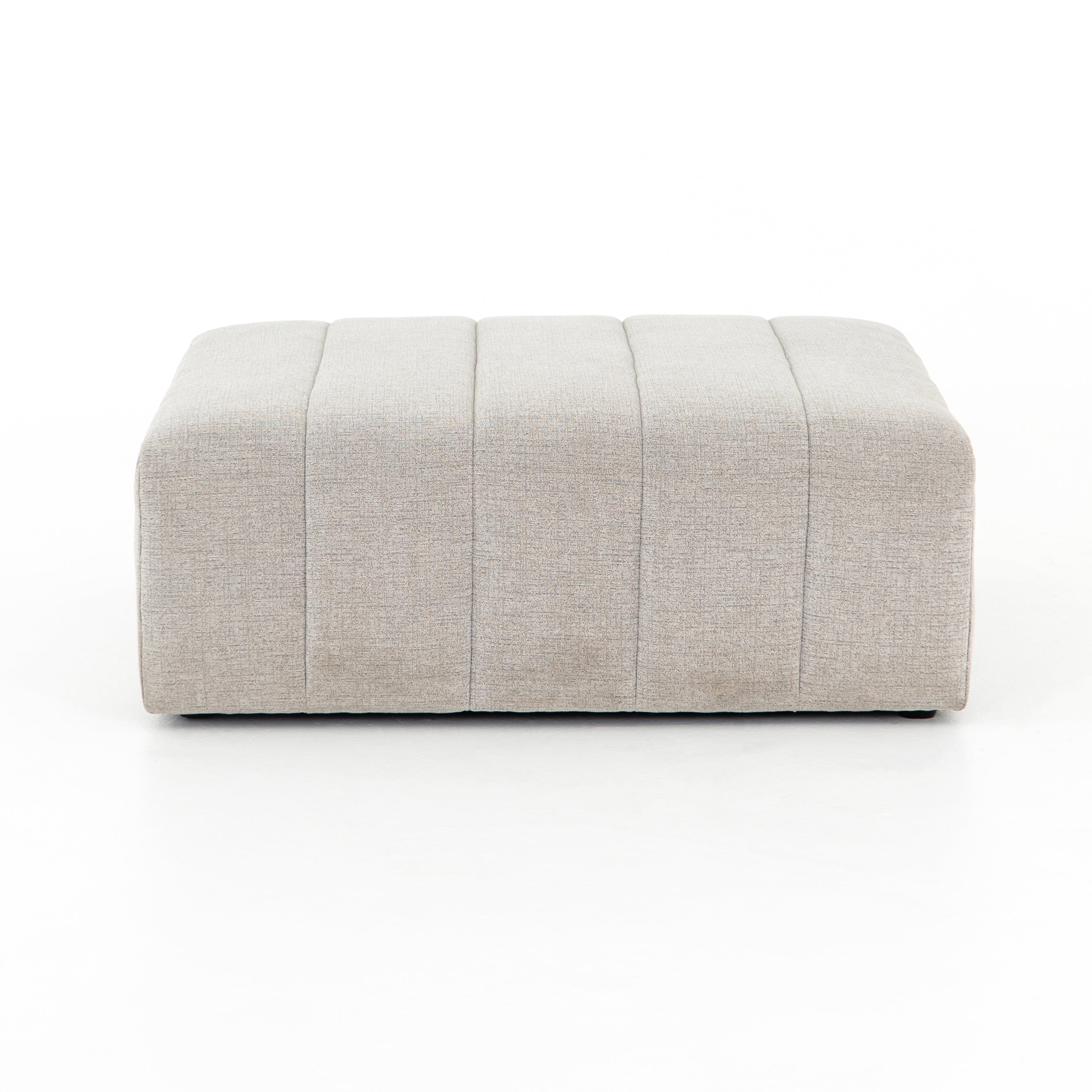 Featuring Langham Napa Sandstone Ottoman by Four Hands at Amethyst Home. Wide, vertical channels and low styling speaks to modish Italian influence. Sandstone-colored covering and modular components allow for versatility in any space. Ottoman to matching sectional. Performance fabrics are specially created to withstand spills, stains, high traffic and wear, en. Amethyst Home provides interior design, new home construction design consulting, vintage area rugs, and lighting in the Austin metro area.