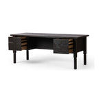 Featuring Concord Charcoal Oak Desk by Four Hands at Amethyst Home. Made from oak veneer with a deep charcoal finish, this executive-size desk delivers ultimate storage, including four drawers on one side plus six open cubbies on the other, granting the option to float-style in a room. Partially turned legs add a design-forward finishing touch.Overall Dimensions: 75"W x 30"L x . Amethyst Home provides interior design, new construction, custom furniture, and area rugs in the Los Angeles metro area.
