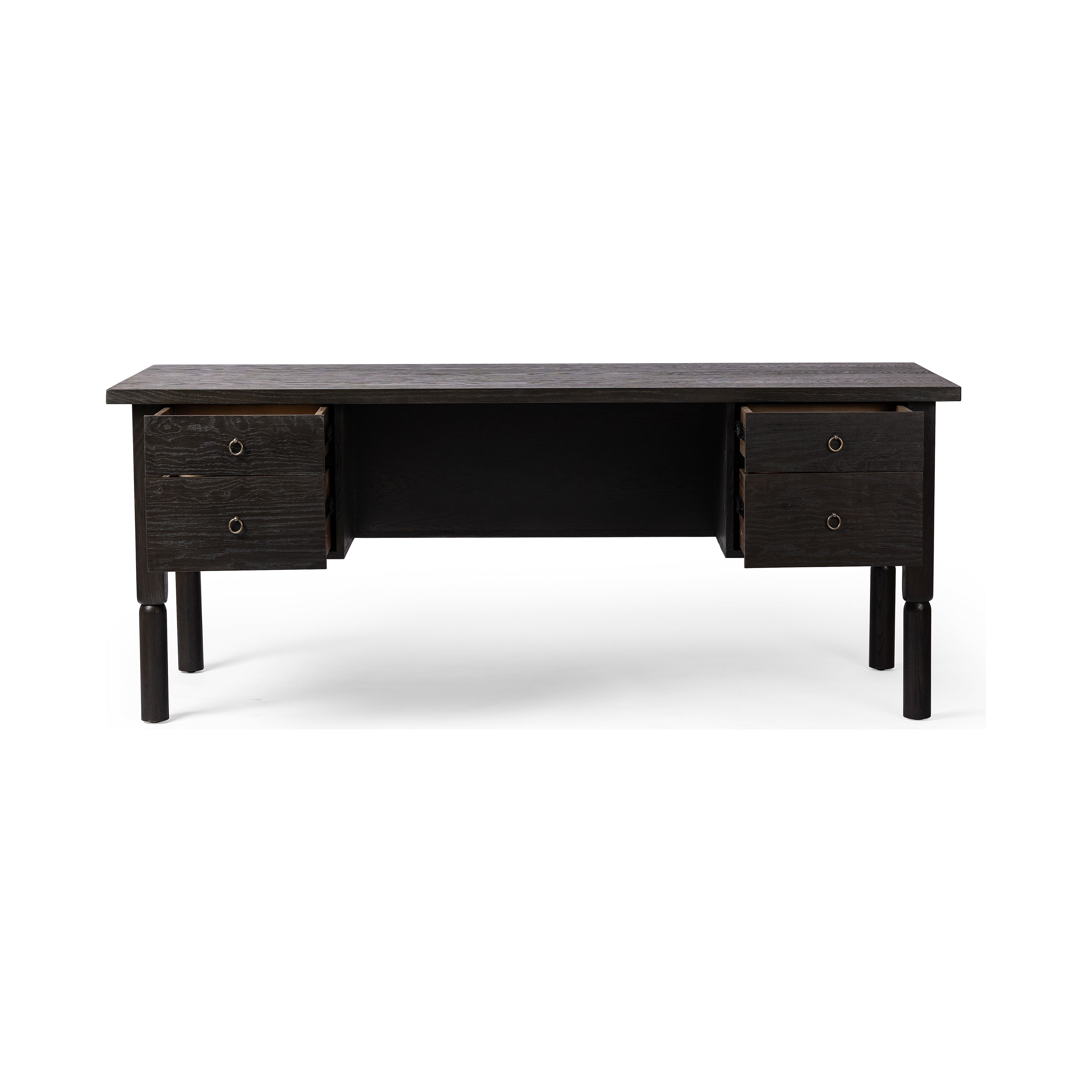 Featuring Concord Charcoal Oak Desk by Four Hands at Amethyst Home. Made from oak veneer with a deep charcoal finish, this executive-size desk delivers ultimate storage, including four drawers on one side plus six open cubbies on the other, granting the option to float-style in a room. Partially turned legs add a design-forward finishing touch.Overall Dimensions: 75"W x 30"L x 30"H. Amethyst Home provides interior design, new construction, custom furniture, and area rugs in the Seattle metro area.