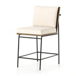 Featuring Crete Savile Flax-Counter Stool by Four Hands at Amethyst Home. Crisp and clean, with natural panache. Slim, black-finished iron frames a floating ladderback of honey-finished oak and cream-colored high-performance seating. Rear handle detail adds a fashionable finishing touch. Performance fabrics are specially created to withstand spills, stains, high traffic and w. Amethyst Home provides interior design, new construction, custom furniture, and area rugs in the Newport Beach metro area.