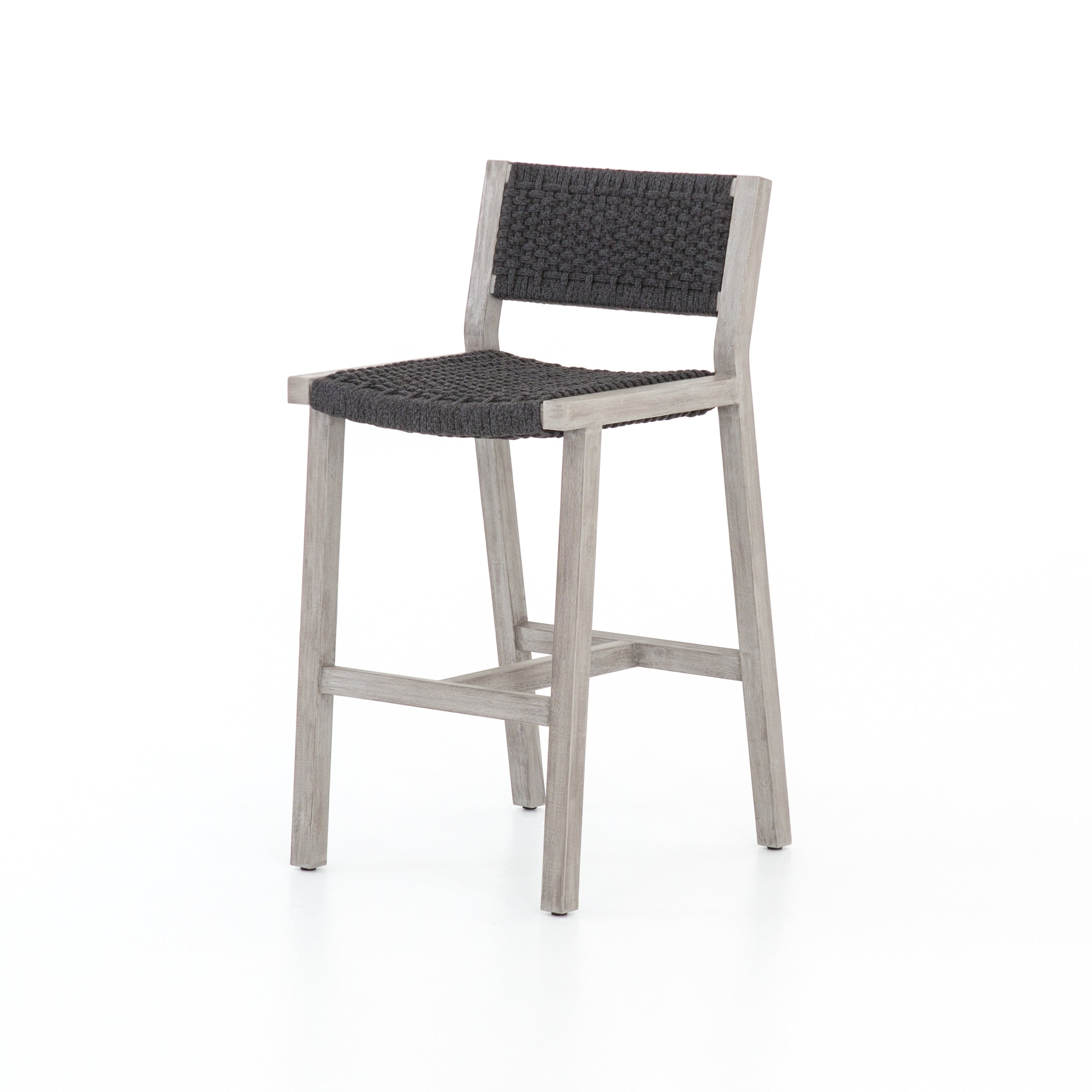 Featuring Delano Grey Outdoor Bar Stool by Four Hands at Amethyst Home. A textural take on outdoor bar styling, weathered grey teak welcomes thick, handwoven rope seating in an inviting grey. Safe for outdoor spaces. Cover or store indoors during inclement weather and when not in use.Overall Dimensions: 19.75"W x 24"L x 40.50"H
Collection: SolanoColors: Thick Dark Grey Rope ,Wea. Amethyst Home provides interior design, new construction, custom furniture, and area rugs in the Scottsdale metro area.