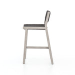 Featuring Delano Grey Outdoor Bar Stool by Four Hands at Amethyst Home. A textural take on outdoor bar styling, weathered grey teak welcomes thick, handwoven rope seating in an inviting grey. Safe for outdoor spaces. Cover or store indoors during inclement weather and when not in use.Overall Dimensions: 19.75"W x 24"L x 40.50"H
Collection: SolanoColors: Thick Dark Grey Rope ,Wea. Amethyst Home provides interior design, new construction, custom furniture, and area rugs in the Washington metro area.