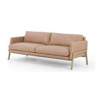 Featuring Diana Palermo Nude Sofa by Four Hands at Amethyst Home. Buttery leather in a chic palette, the Diana sofa is charming and ultra comfy.  The wooden frame detail is an extra special touch.
Collection: KensingtonColors: Palermo Nude ,Natural Whitewash AshMaterials: Top Grain Leather ,Solid AshOverall Dimensions: 84"W x 36"L x 32"H Weight: 134.5 lbsSeat Depth: 23.5" Seat H. Amethyst Home provides interior design, new construction, custom furniture, and area rugs in the Alpharetta metro area.
