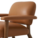 Featuring Eisley Trevino Camel Accent Chair by Four Hands at Amethyst Home. Sleek and inviting, this wood-meets-leather arm chair is timeless in any context. Large cylindrical legs support the upholstered back and seat, which are covered in camel-colored top-grain leather. Spring suspension adds comfort and durability to the seat cushion.
Collection: CarnegieCo. Amethyst Home provides interior design, new home construction design consulting, vintage area rugs, and lighting in the Omaha metro area.