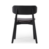 Featuring Franco Sonoma Black Upholstered Dining Chair by Four Hands at Amethyst Home. A fresh, exaggerated take on the wing-back dining chair. Finished a classic jet black, a mix of solid ash and ash veneer makes a modern and shapely seating statement with midcentury undertones. Complemented by a cushioned seat in black top-grain leather exclusive to Four Hands.Overall Dimensions: . Amethyst Home provides interior design, new construction, custom furniture, and area rugs in the Austin metro area.