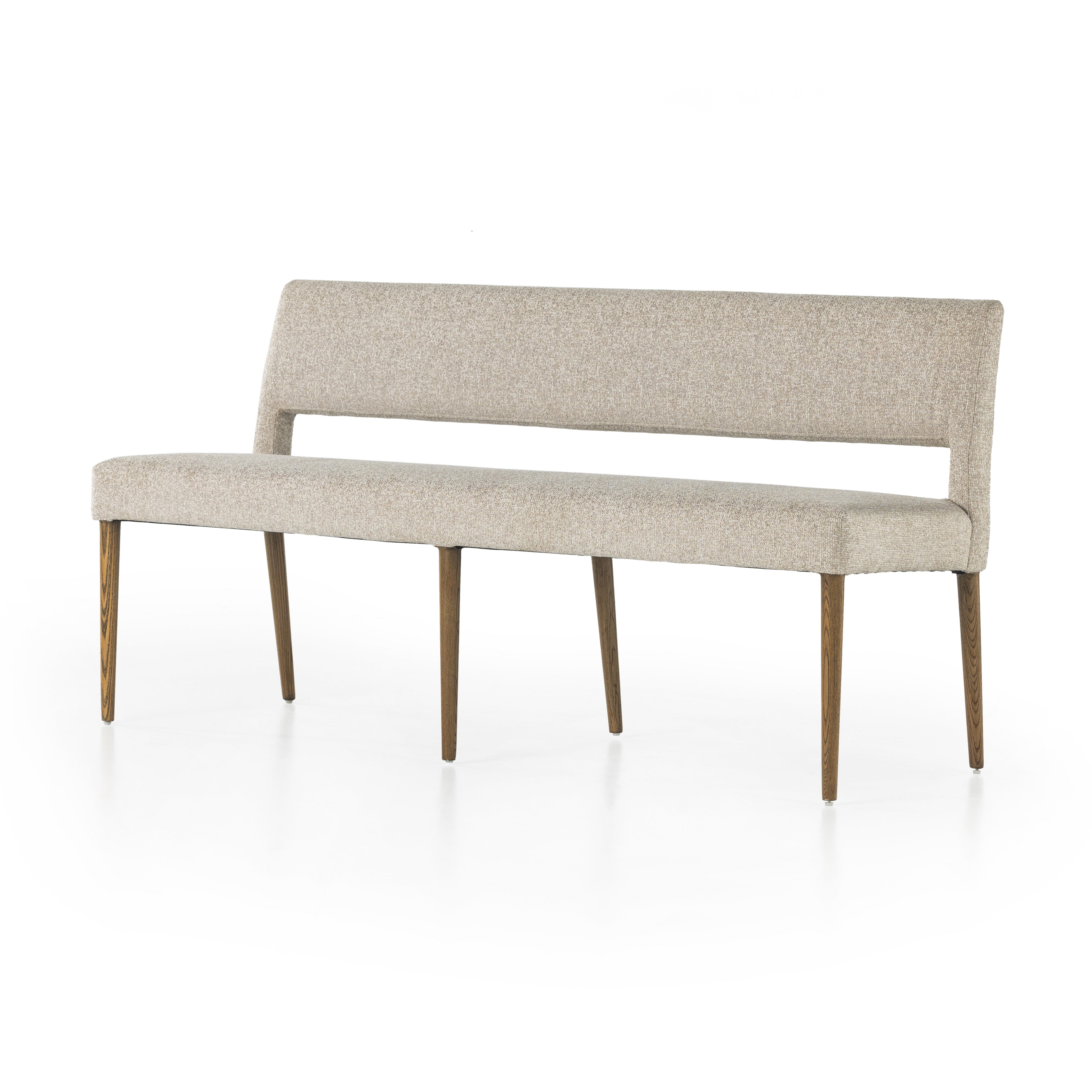 Featuring Joseph Light Camel Dining Bench by Four Hands at Amethyst Home. Simply styled and midcentury-minded, Joseph Light Camel Dining Bench is a textural light taupe upholstery that features a posterior cutout for added flair, with toasted nettlewood legs for natural contrast.
Overall Dimensions: 65"W x 22.75"L x 32"HWeight: 38.34 lbsMaterials: 100% Polyester, Solid Nettlewood. Amethyst Home provides interior design services, furniture, rugs, and lighting in the Austin metro area.