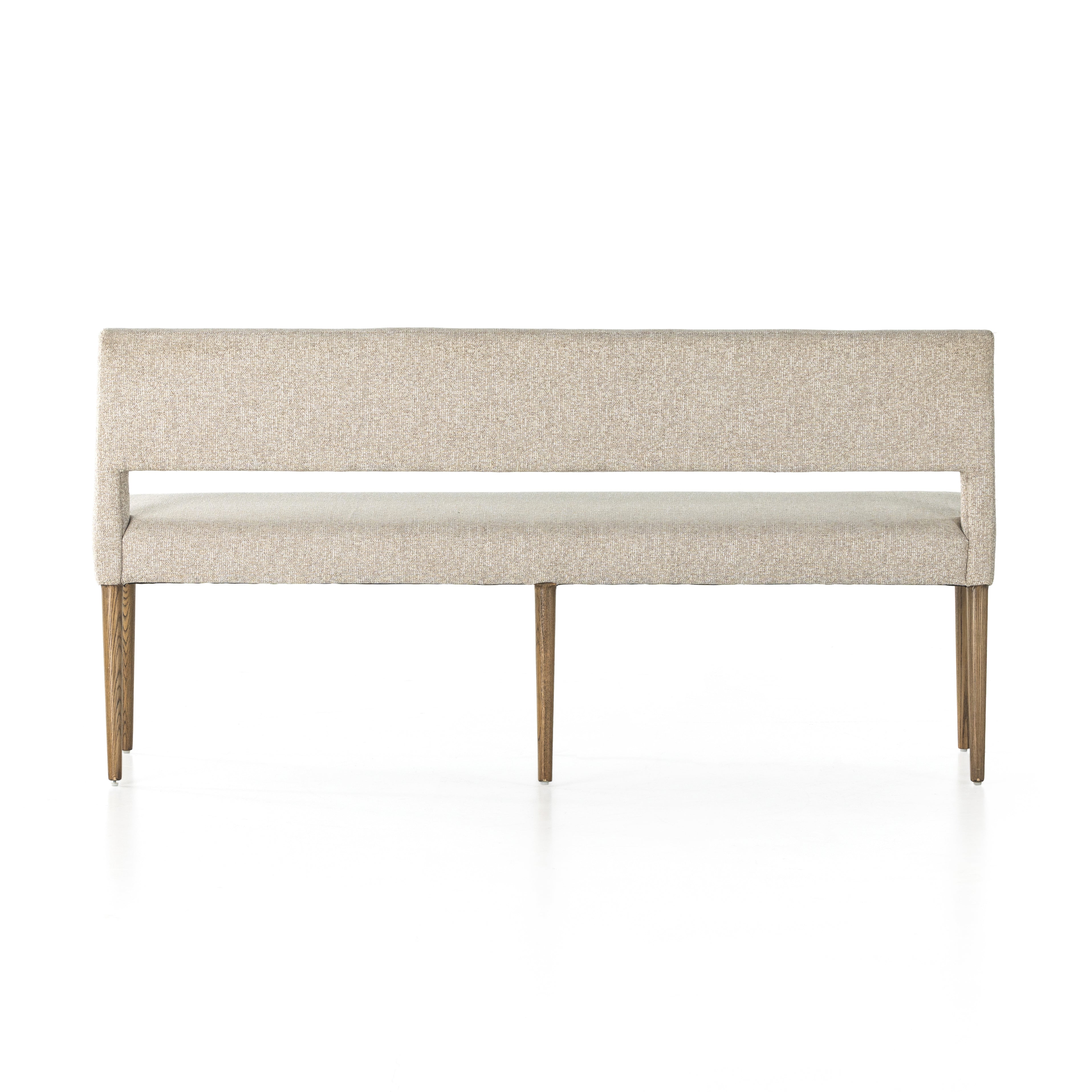 Featuring Joseph Light Camel Dining Bench by Four Hands at Amethyst Home. Simply styled and midcentury-minded, Joseph Light Camel Dining Bench is a textural light taupe upholstery that features a posterior cutout for added flair, with toasted nettlewood legs for natural contrast.
Overall Dimensions: 65"W x 22.75"L x 32"HWeight: 38.34 lbsMaterials: 100% Polyester, Solid Nettlewood. Amethyst Home provides interior design services, furniture, rugs, and lighting in the Kansas City metro area.