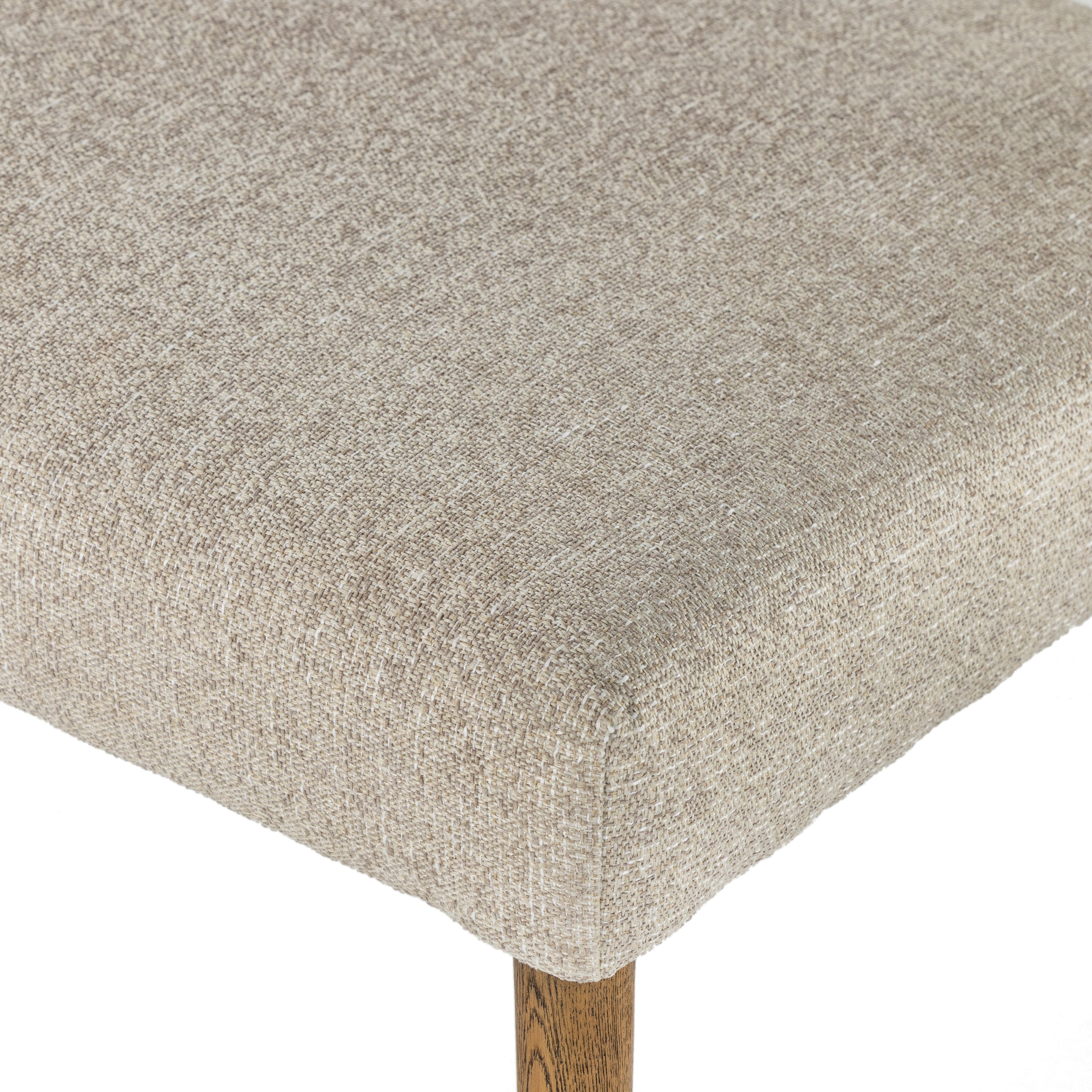 Featuring Joseph Light Camel Dining Bench by Four Hands at Amethyst Home. Simply styled and midcentury-minded, Joseph Light Camel Dining Bench is a textural light taupe upholstery that features a posterior cutout for added flair, with toasted nettlewood legs for natural contrast.
Overall Dimensions: 65"W x 22.75"L x 32"HWeight: 38.34 lbsMaterials: 100% Polyester, Solid Nettlewood. Amethyst Home provides interior design services, furniture, rugs, and lighting in the Miami metro area.