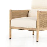 Featuring Kempsey Kerby Ivory Chair by Four Hands at Amethyst Home. Craft a Parisian vibe with French-inspired seating. With a soft, comfortable texture and light cream hue, high performance-upholstered seating is perfectly positioned for comfort, with ash framing and woven sides of natural cane. Performance fabrics are specially created to withstand spills, st. Amethyst Home provides interior design, new home construction design consulting, vintage area rugs, and lighting in the Tampa metro area.