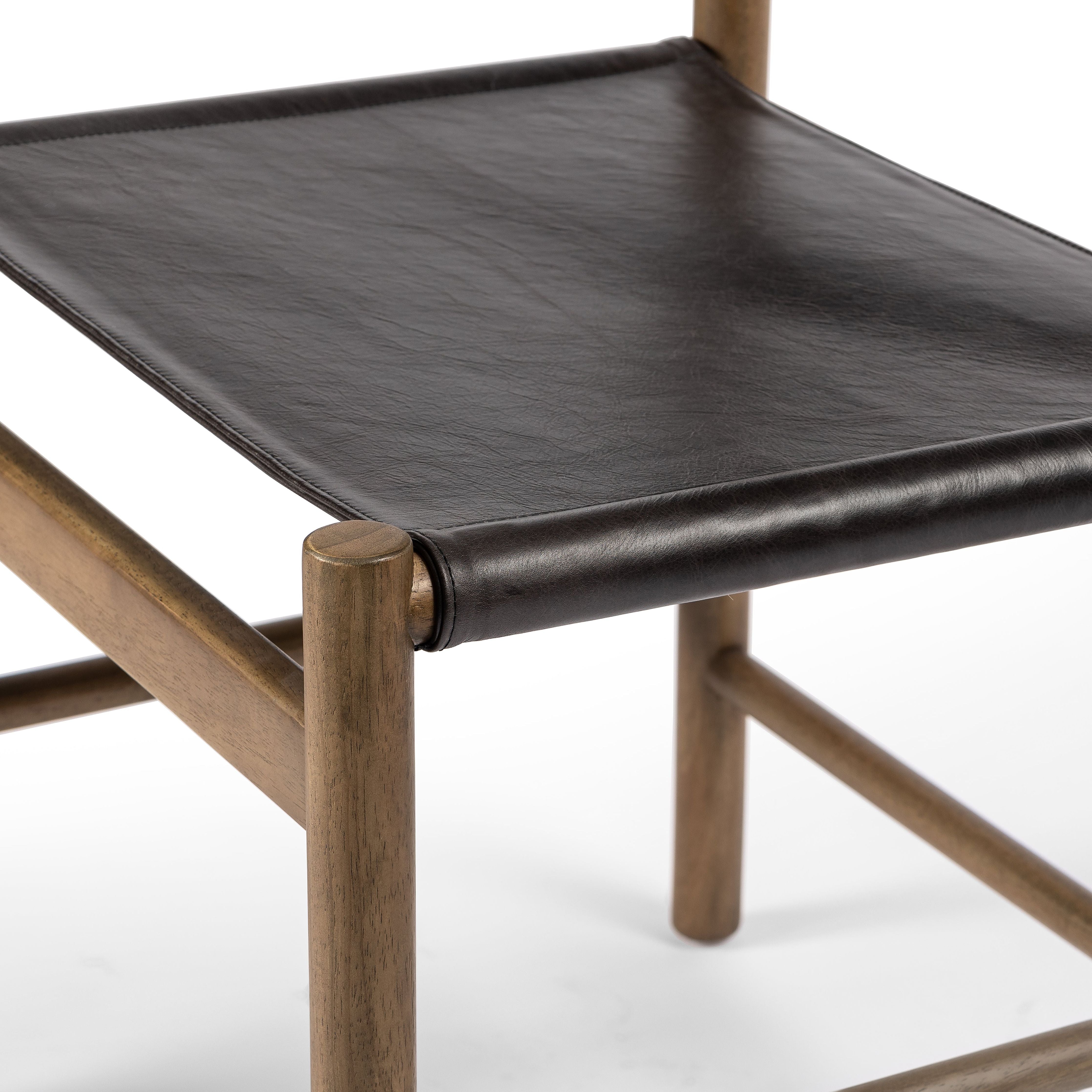 Featuring Kena Vintage Natural Dining Chair by Four Hands at Amethyst Home. Solid parawood forms a simple, vintage-inspired frame for sling-style seating of chocolate top-grain leather.
Collection: WestgateColors: Sonoma Black, Vintage NaturalMaterials: Top Grain Leather, Solid ParawoodOverall Dimensions: 23.50"W x 21"L x 34.50"HWeight: 12.35 lbVolume: 8.69 cu ftSeat Depth: 17.75". Amethyst Home provides interior design, new construction, custom furniture, and area rugs in the Portland metro area.