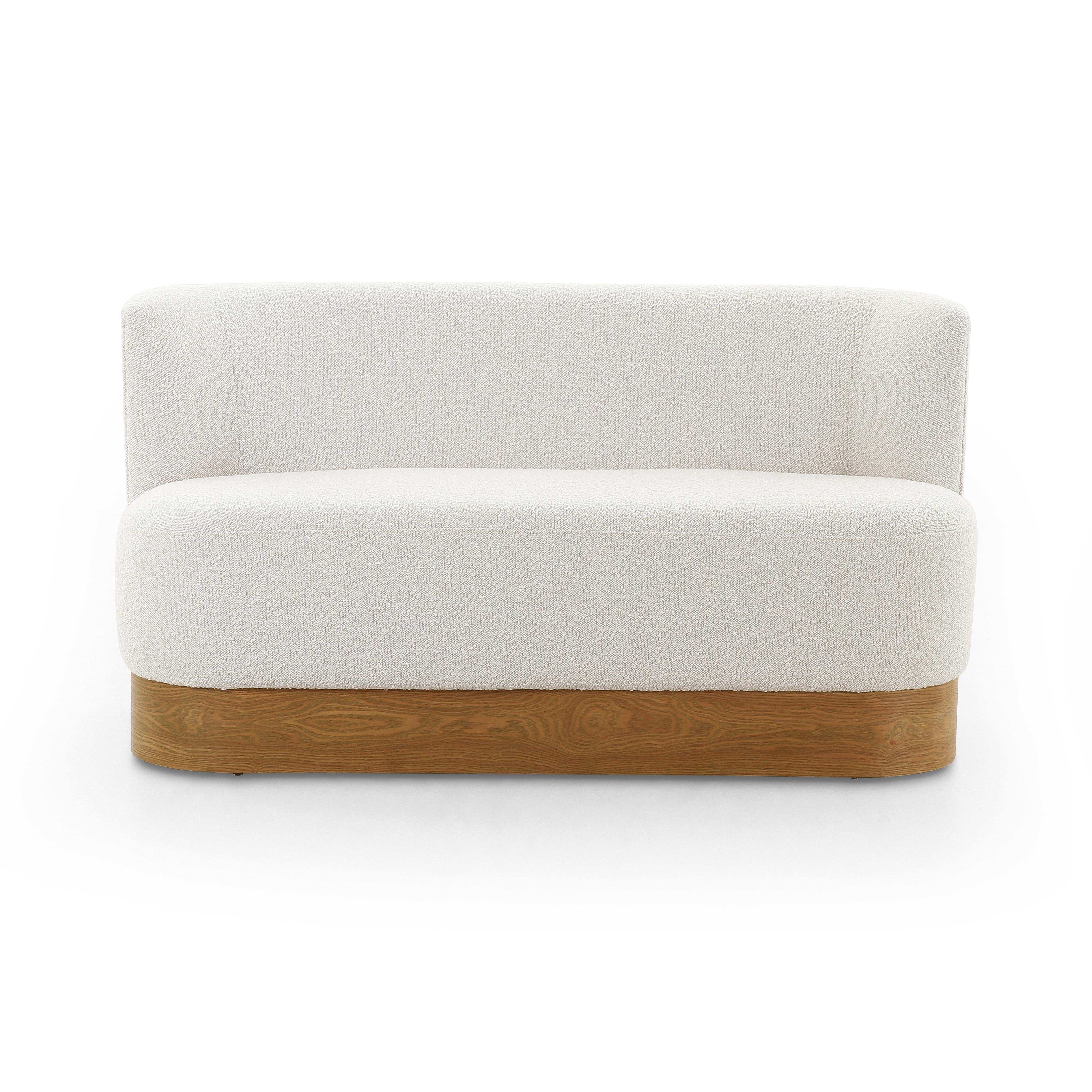 Featuring Krista Knoll Natural Dining Bench by Four Hands at Amethyst Home. Style takes shape. Comfortably curved bench seating is upholstered in a chunky off-white boucle, with water-repellent performance fabric for a modern touch. A plinth-style ash veneer base works casual contrast into the mix. Perfectly sized for a cozy breakfast nook; pair up to suit . Amethyst Home provides interior design, new home construction design consulting, vintage area rugs, and lighting in the San Diego metro area.