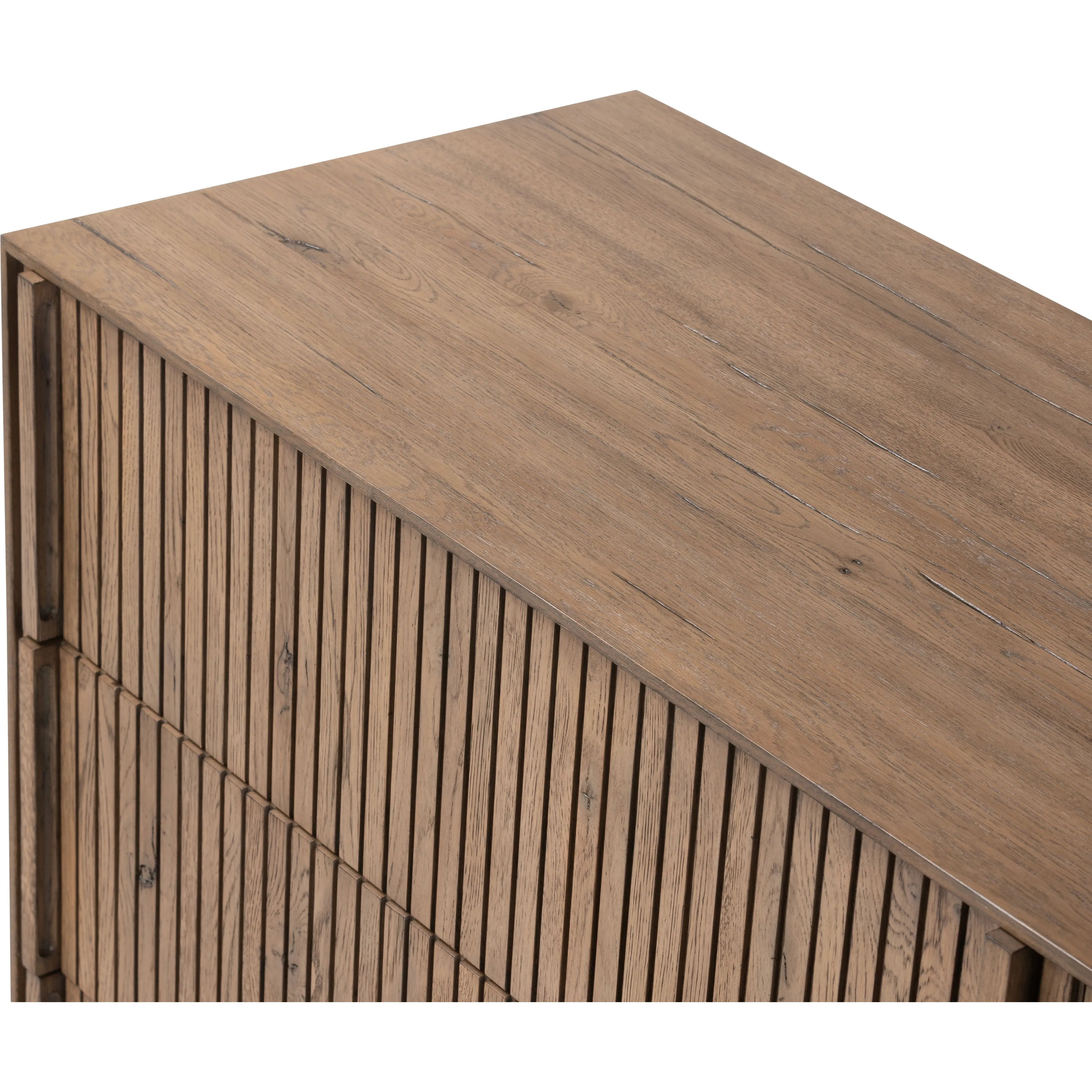 Featuring Leo Rustic Grey 6 Drawer Dresser by Four Hands at Amethyst Home. Designed by Thomas Bina and Ronald Sasson, a design partnership blending both modern minimalist and Brazilian influences. Crafted from solid oak, this clean-lined dresser features vertical reed detailing on the drawer fronts with wooden pull detailing on the outer edges. Drawers are f. Amethyst Home provides interior design, new home construction design consulting, vintage area rugs, and lighting in the Portland metro area.