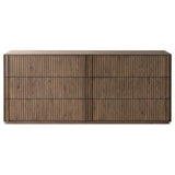 Featuring Leo Rustic Grey 6 Drawer Dresser by Four Hands at Amethyst Home. Designed by Thomas Bina and Ronald Sasson, a design partnership blending both modern minimalist and Brazilian influences. Crafted from solid oak, this clean-lined dresser features vertical reed detailing on the drawer fronts with wooden pull detailing on the outer edges. Drawers are . Amethyst Home provides interior design, new home construction design consulting, vintage area rugs, and lighting in the San Diego metro area.