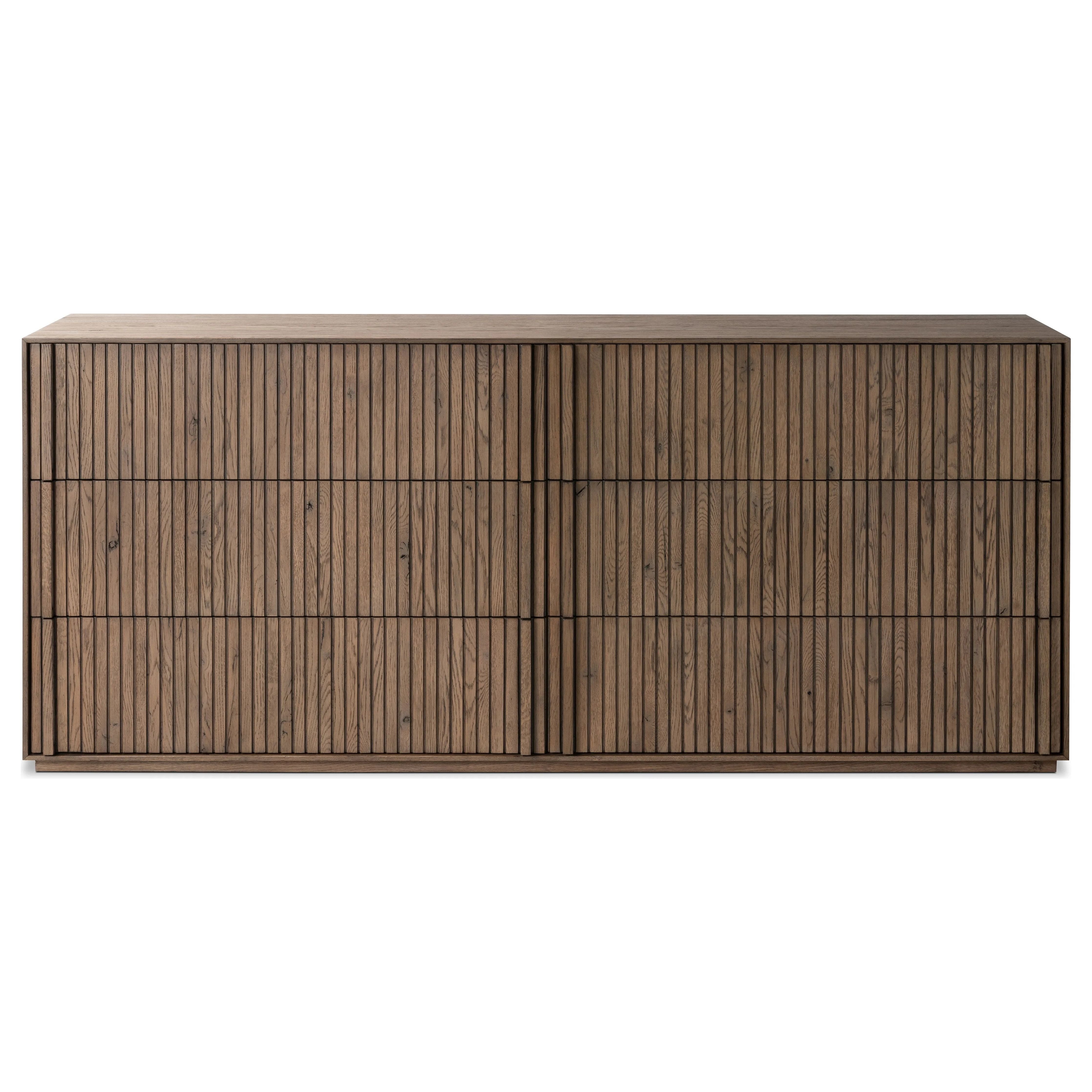 Featuring Leo Rustic Grey 6 Drawer Dresser by Four Hands at Amethyst Home. Designed by Thomas Bina and Ronald Sasson, a design partnership blending both modern minimalist and Brazilian influences. Crafted from solid oak, this clean-lined dresser features vertical reed detailing on the drawer fronts with wooden pull detailing on the outer edges. Drawers are . Amethyst Home provides interior design, new home construction design consulting, vintage area rugs, and lighting in the San Diego metro area.