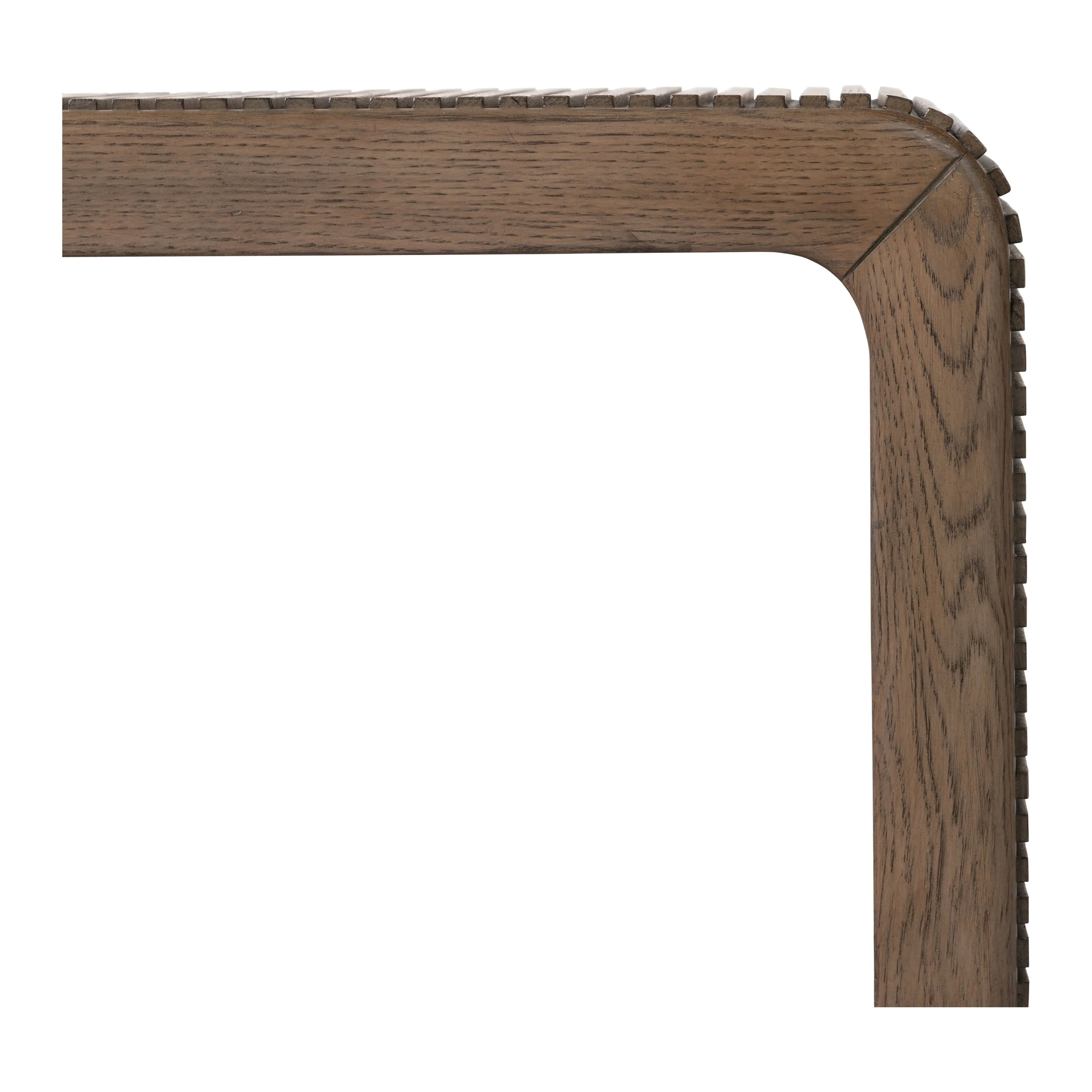 Featuring Leo Rustic Grey Coffee Table by Four Hands at Amethyst Home. Grey-finished oak shapes an elongated coffee table, rich with reeding. Subtly rounded edges reflect Brazilian midcentury inspiration behind this crafted minimalist piece. Designed in partnership with longtime Four Hands collaborator Thomas Bina and designer Ronald Sasson.Overall Dimensions:. Amethyst Home provides interior design, new home construction design consulting, vintage area rugs, and lighting in the Dallas metro area.