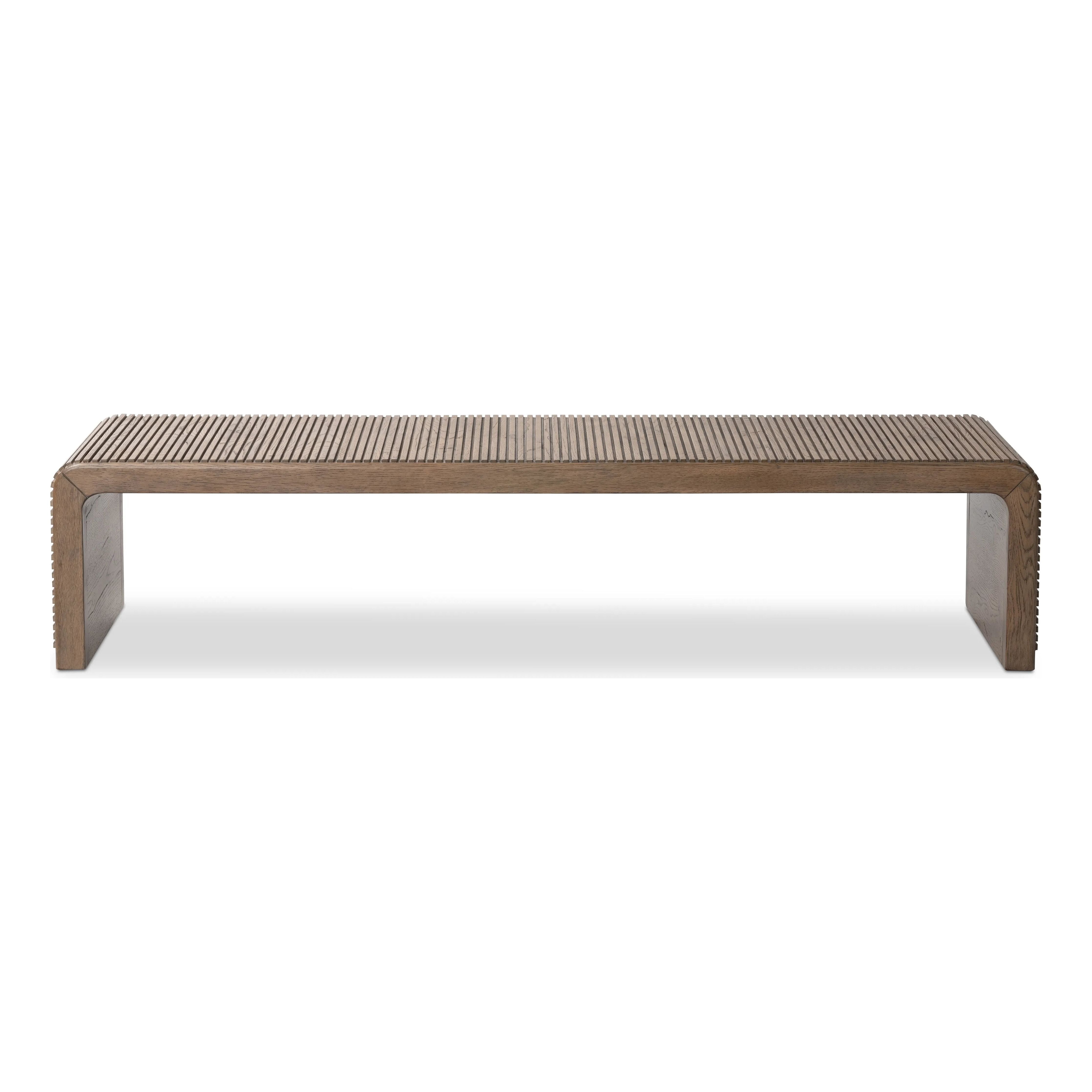 Featuring Leo Rustic Grey Coffee Table by Four Hands at Amethyst Home. Grey-finished oak shapes an elongated coffee table, rich with reeding. Subtly rounded edges reflect Brazilian midcentury inspiration behind this crafted minimalist piece. Designed in partnership with longtime Four Hands collaborator Thomas Bina and designer Ronald Sasson.Overall Dimensio. Amethyst Home provides interior design, new home construction design consulting, vintage area rugs, and lighting in the Nashville metro area.