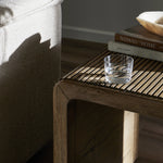 Featuring Leo Rustic Grey End Table by Four Hands at Amethyst Home. Made from rustic-finished oak, linear reeding and a curved shape define this midcentury-spirited end table. Designed in partnership with longtime Four Hands collaborator Thomas Bina and Brazilian designer Ronald Sasson.Overall Dimensions: 23.5"W x 27.5"L x 22"H
Collection: BinaColors: Ru. Amethyst Home provides interior design, new home construction design consulting, vintage area rugs, and lighting in the Laguna Beach metro area.