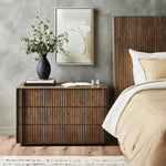 Featuring Leo Rustic Grey Nightstand by Four Hands at Amethyst Home. Designed by Thomas Bina and Ronald Sasson, a design partnership blending both modern minimalist and Brazilian influences. Crafted from solid oak, this clean-lined nightstand features vertical reed detailing on the drawer fronts with wooden pull detailing on the outer edges. Drawers are finishe. Amethyst Home provides interior design, new home construction design consulting, vintage area rugs, and lighting in the Tampa metro area.