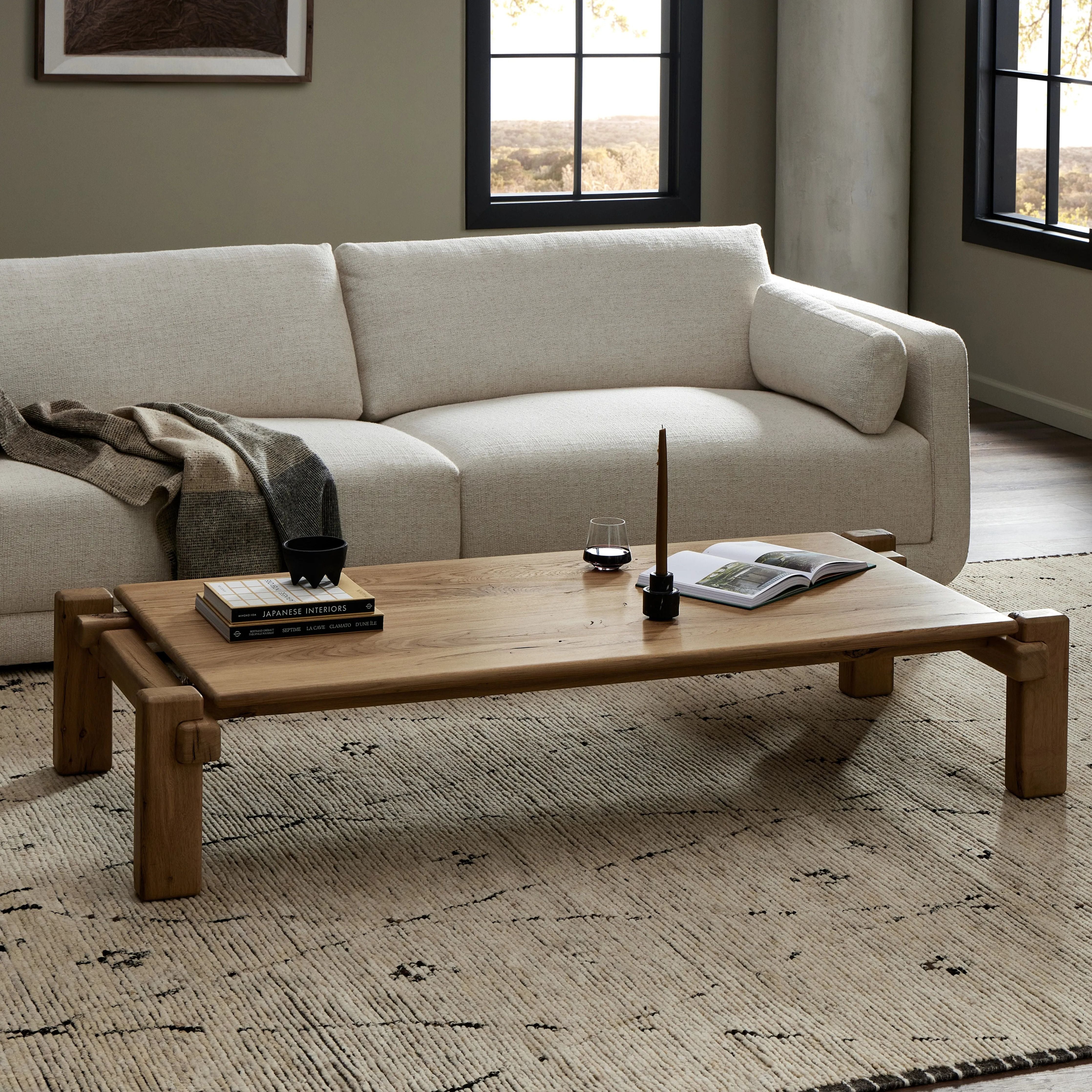 Featuring Marcia French Oak Large Coffee Table by Four Hands at Amethyst Home. Designed by Thomas Bina and Ronald Sasson, a design partnership blending both modern minimalist and Brazilian influences. Crafted from natural reclaimed French oak with overstated joint details. Rounded edges bring a soft, playful feel to the entire piece.Overall Dimensions: 31.5"W x. Amethyst Home provides interior design, new home construction design consulting, vintage area rugs, and lighting in the Tampa metro area.