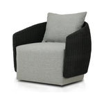 Featuring Maven Faux Black Outdoor Swivel Chair by Four Hands at Amethyst Home. Sustainably made with zero waste, luxurious Italian upholstery places a new and unique spin on indoor/outdoor seating, offering soft, durable fabric that's highly resistant to sun, stains, mold and abrasion. Shell framing in black faux-hyacinth weaves for extra texture atop a 360-de. Amethyst Home provides interior design, new home construction design consulting, vintage area rugs, and lighting in the Omaha metro area.
