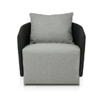 Featuring Maven Faux Black Outdoor Swivel Chair by Four Hands at Amethyst Home. Sustainably made with zero waste, luxurious Italian upholstery places a new and unique spin on indoor/outdoor seating, offering soft, durable fabric that's highly resistant to sun, stains, mold and abrasion. Shell framing in black faux-hyacinth weaves for extra texture atop a 36. Amethyst Home provides interior design, new home construction design consulting, vintage area rugs, and lighting in the Park City metro area.